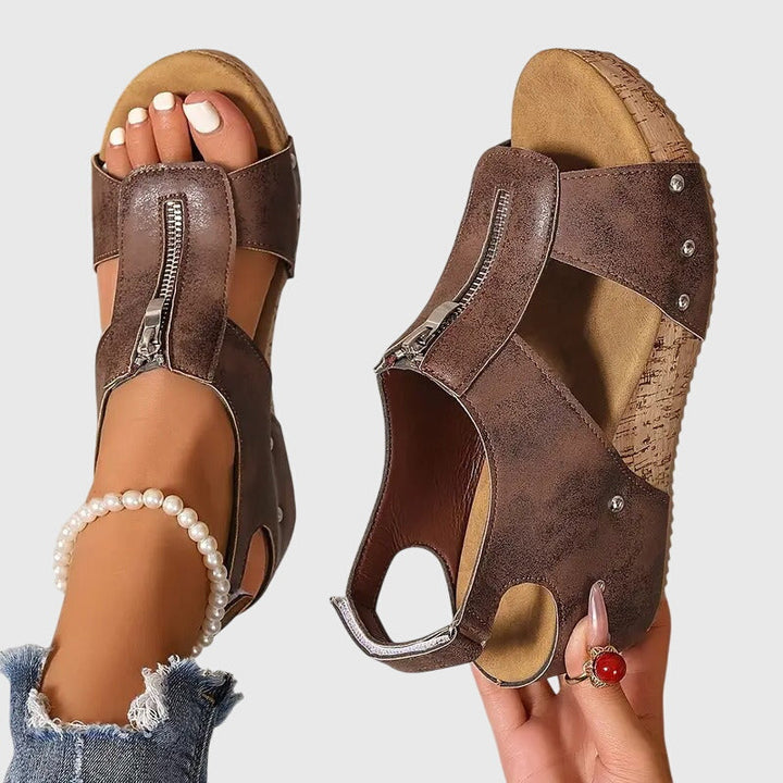 Black women's orthopaedic sandals, perfect for casual summer wear & all-day comfort with arch support.