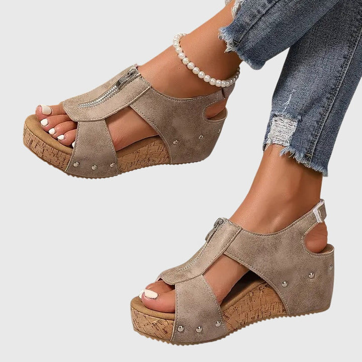 Close-up of orthopaedic sandals' arch support, providing women's foot pain relief & comfort footwear.