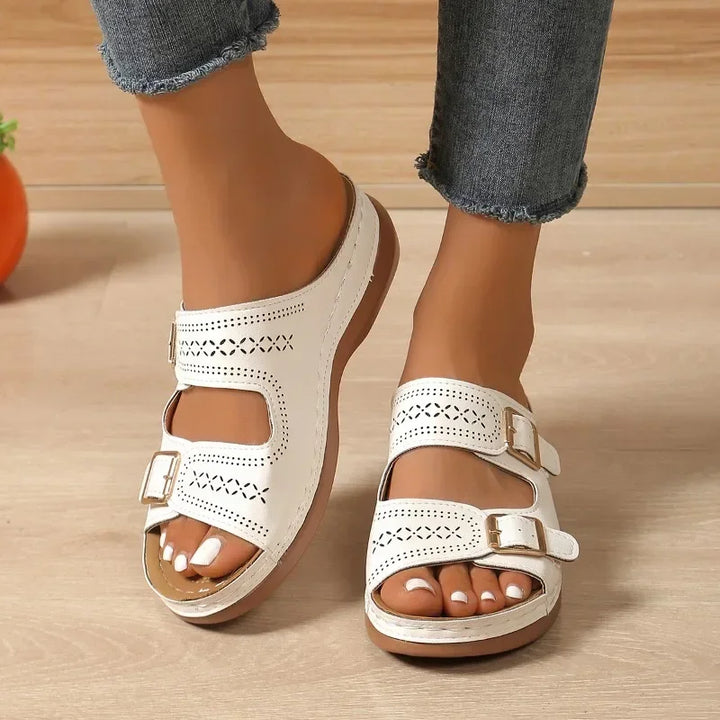 Beige women's comfort sandals, adjustable for wide fit. Ergonomic design provides arch support for casual summer wear.