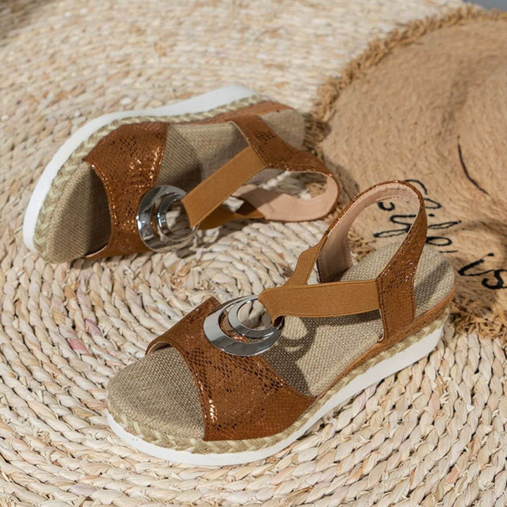 Women's comfortable orthopaedic sandals with arch support, adjustable for foot health.