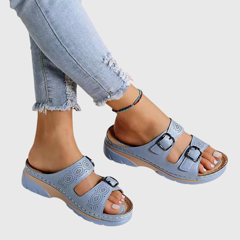 Women's orthopaedic sandals with arch support, memory foam, adjustable straps for comfortable summer wear.