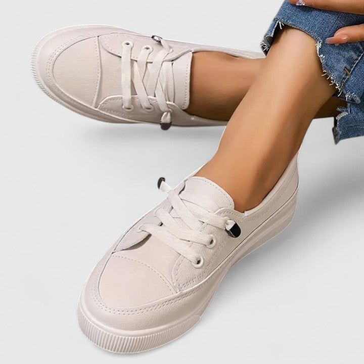 Stylish women's orthopaedic sneakers, perfect for walking and casual everyday wear, modern design.