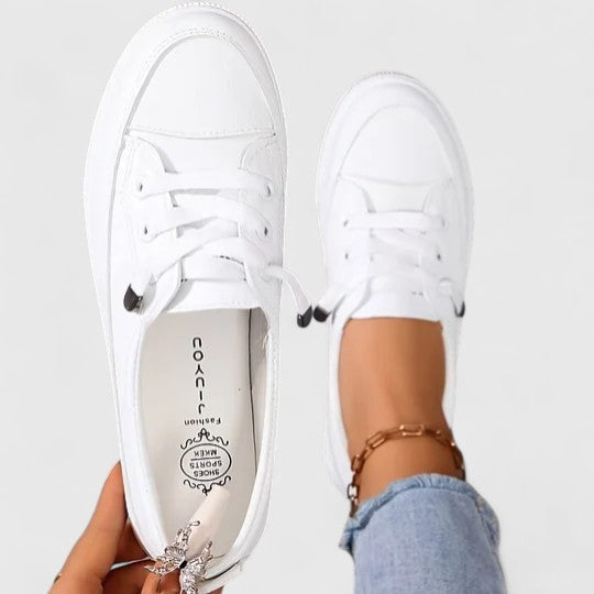Comfortable women's walking sneakers with orthopaedic foot support for active lifestyles.