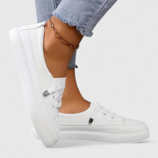 Modern women's orthopaedic sneakers combining sleek style with essential foot health and support.