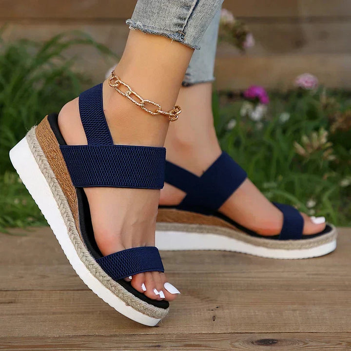 Back view of women's orthopaedic sandals, showcasing a stable sole & comfortable straps for secure summer footwear.