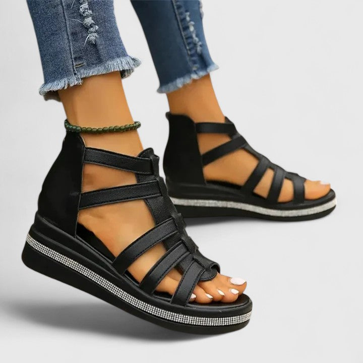 Elegant women's comfort sandals with supportive orthopaedic design and shimmering strass details.