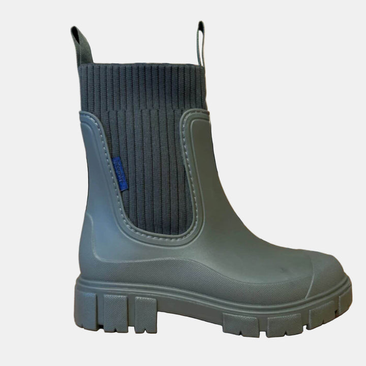 Stylish waterproof women's boots with non-slip sole, offering supportive comfort for autumn & winter.