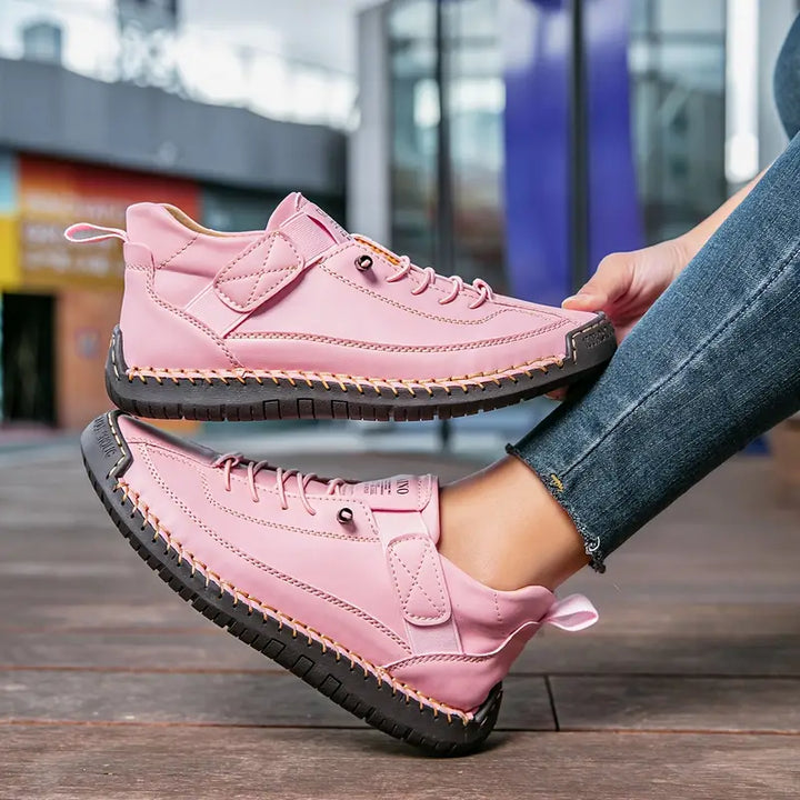 Side view: Women's orthopaedic trainers, showcasing cushioned sole & wide fit for comfort.