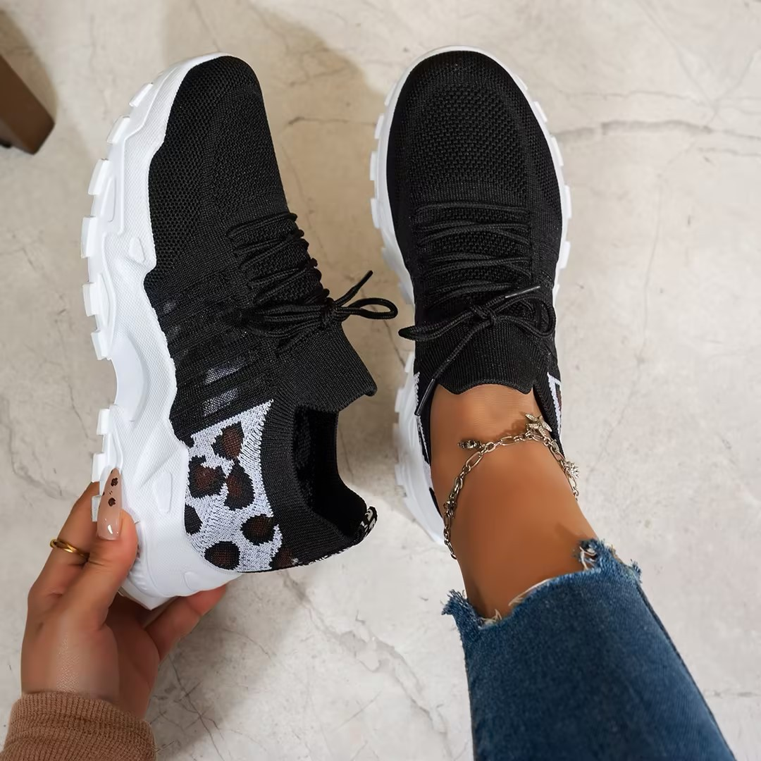 Women's pain relief footwear: supportive trainers with wide toe box & ergonomic comfort.