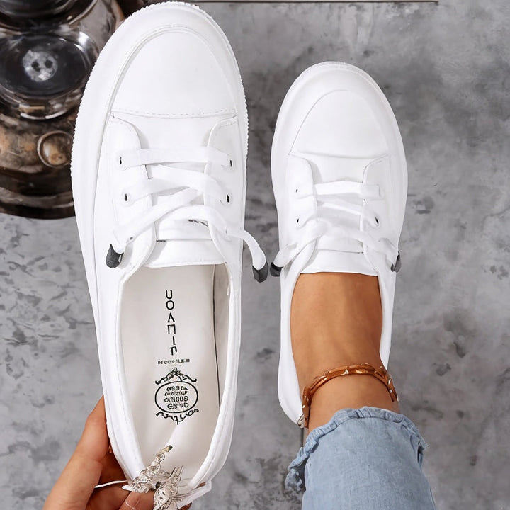 Comfortable women's orthopaedic trainers with excellent arch support, cushioning, and slip-resistant outsole for daily wear.