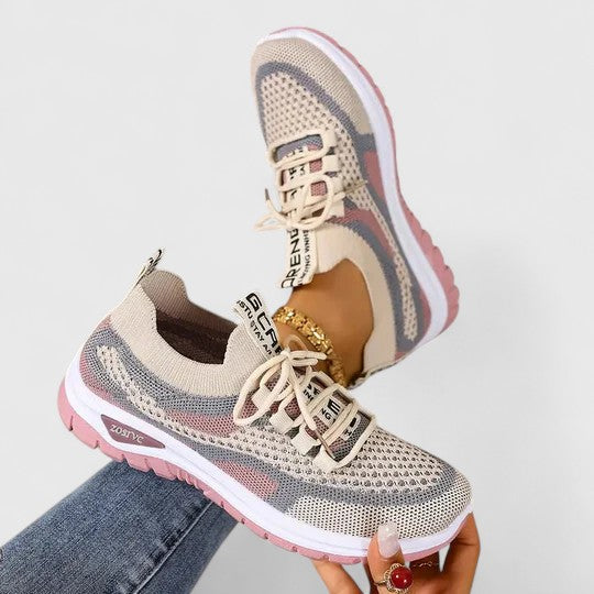 Breathable women's athletic sneakers with superior arch support, perfect for active lifestyles.