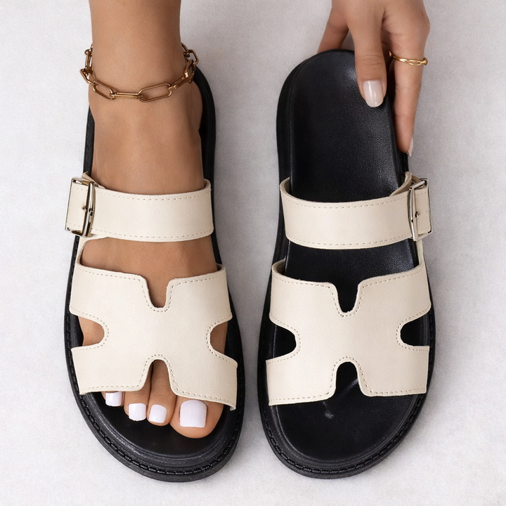 Supportive women's walking sandals, designed for orthopaedic comfort with integrated arch support.