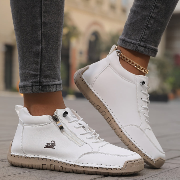 Wide fit women's orthopaedic sneakers with superior arch support.