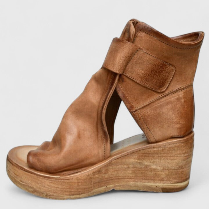 Women's orthopaedic wedge sandals for posture correction & foot support, offering pain relief & all-day comfort.