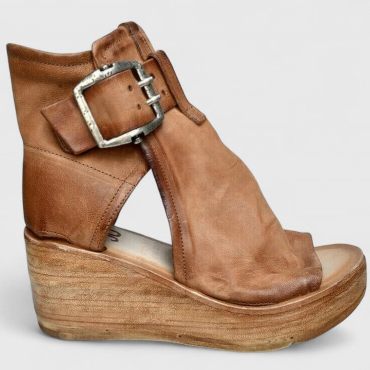 Summer women's sandals, comfortable orthopaedic wedge design with foot support & arch relief for daily wear.
