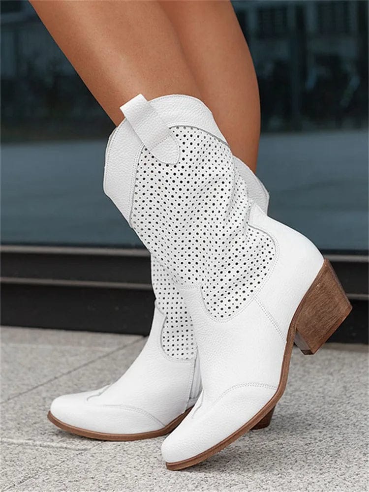 Fashionable women's western boots with comfortable block heel & convenient side zipper closure.