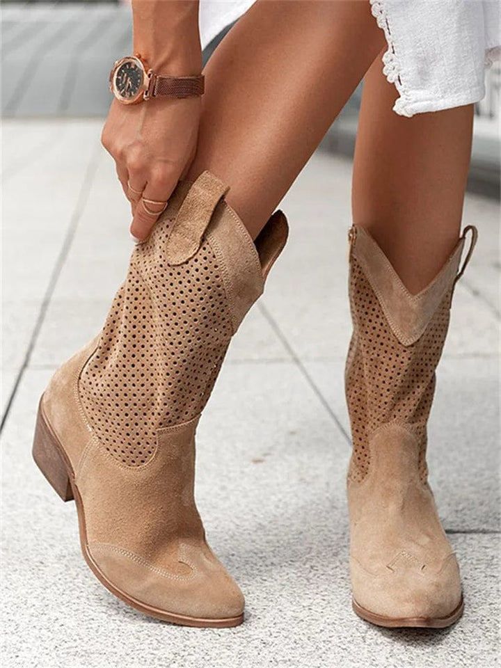 Women's comfortable orthopaedic ankle boots with block heel and practical side zipper.