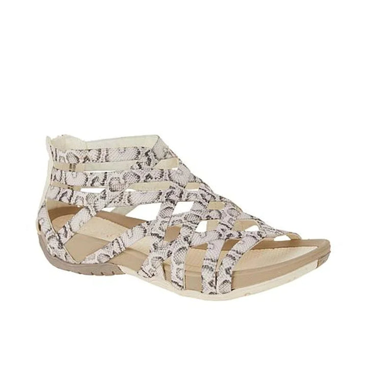 Women's orthopedic sandals with arch support, adjustable caged design, and practical zip fastening.