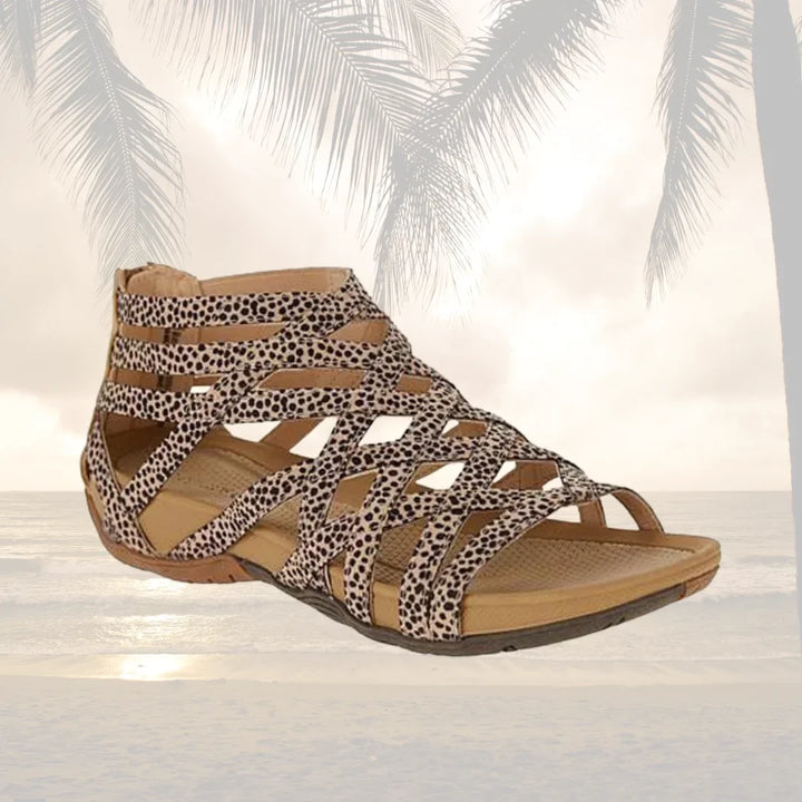 Comfortable & stylish women's orthopedic caged sandals, adjustable fit, and secure zip closure.