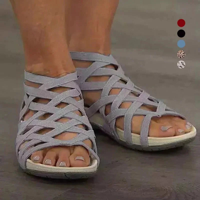 Stylish women's orthopedic sandals, adjustable fit, caged design, convenient zip closure, arch support.