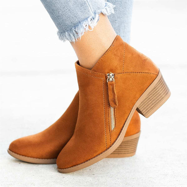 Women's orthopedic ankle boots with zipper closure. Comfortable foot support for walking.