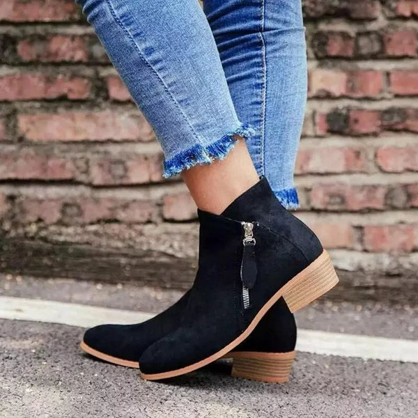 Black women's orthopedic ankle boots, easy zipper closure. Provides excellent foot support.