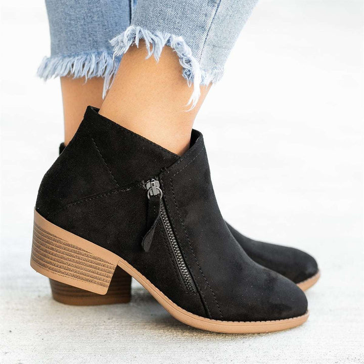 Supportive women's orthopedic ankle boots with zipper, designed for ultimate foot comfort.