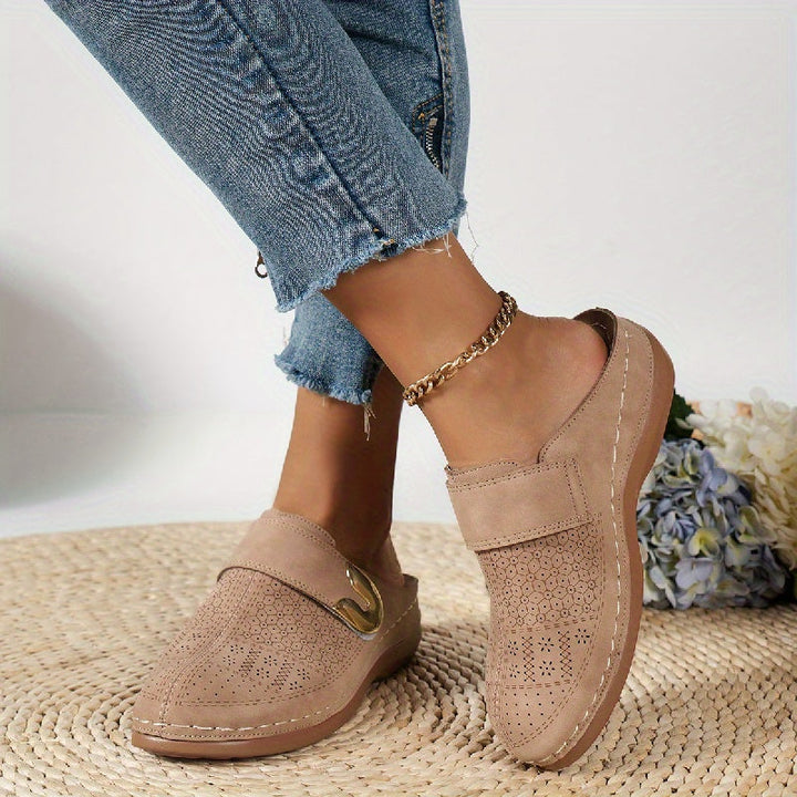 Stylish women's orthopedic slippers, designed for arch support & ultimate comfort. Features a non-slip indoor sole.