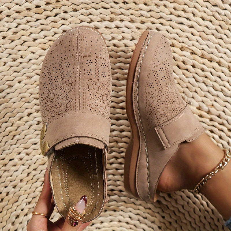 Close-up of women's non-slip sole on orthopedic slippers. Provides secure grip & comfort for indoor use.