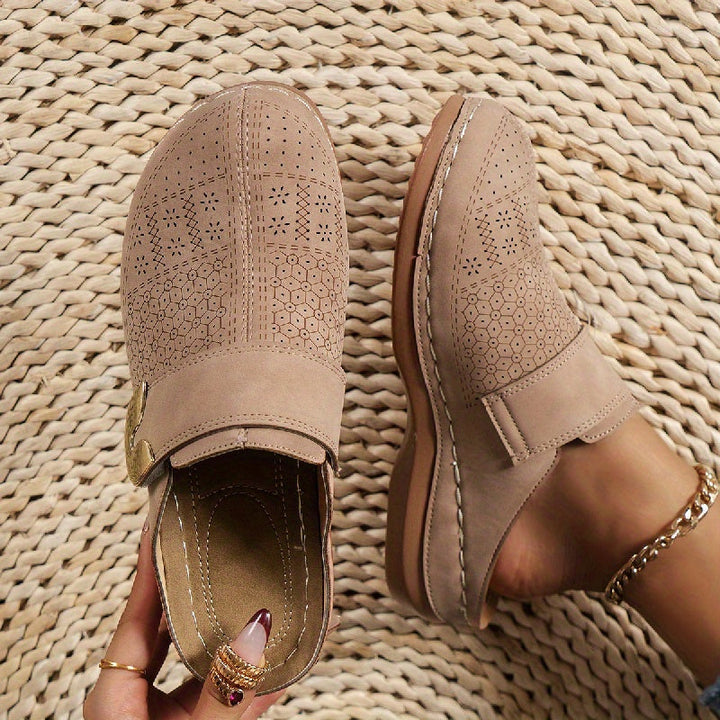 Close-up of women's non-slip sole on orthopedic slippers. Provides secure grip & comfort for indoor use.