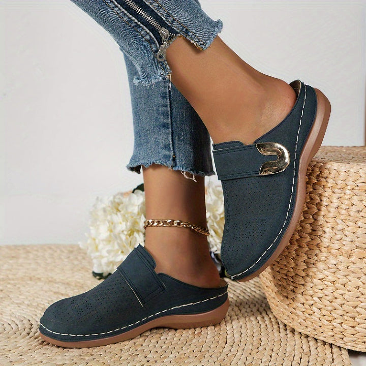 Ergonomic women's indoor slippers with plush cushioning & crucial arch support. Features a durable non-slip sole.
