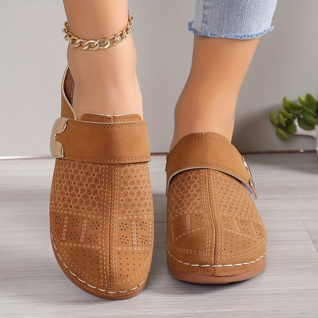 Premium women's comfort slippers for foot relief. Orthopedic arch support & a secure non-slip sole for home.