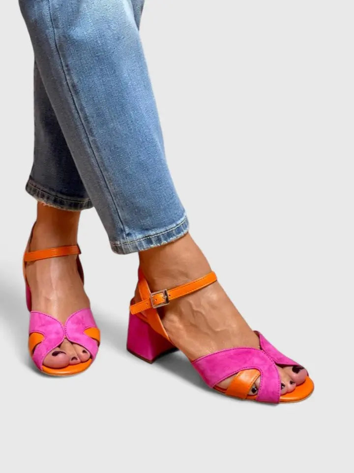 Versatile orange orthopedic block heel sandals for women, featuring a comfortable ankle strap design.