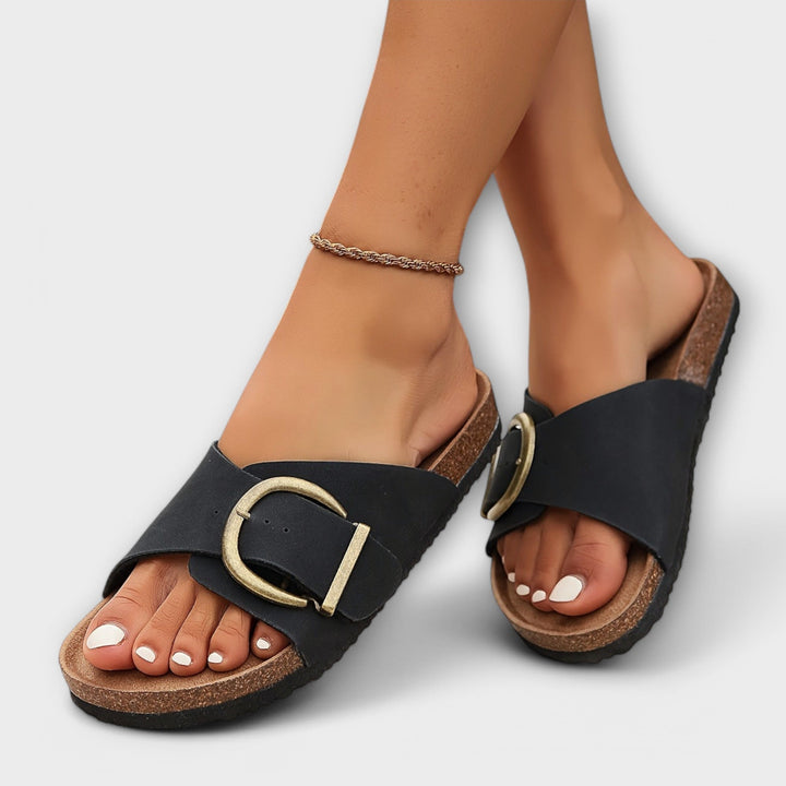 Women's orthopedic buckle slide sandals for arch support and all-day comfort.