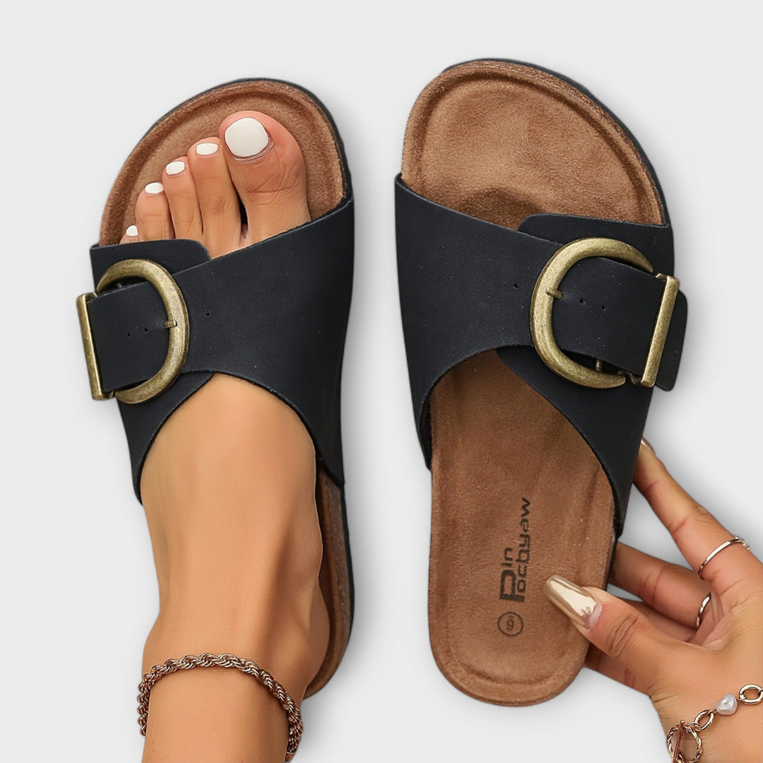 Comfortable women's slide sandals with adjustable buckles, offering orthopedic foot support.