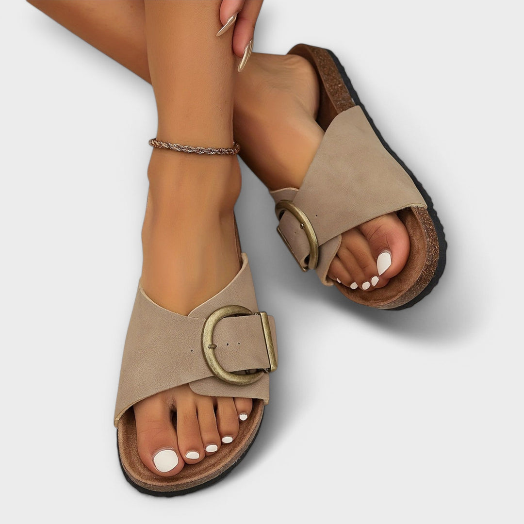 Ergonomic women's summer slide sandals with buckle detail for custom fit and support.