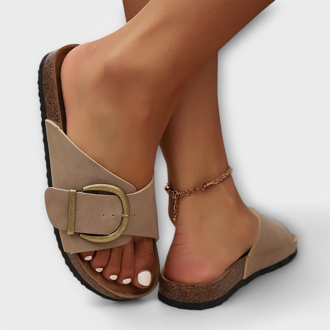 Orthopedic women's buckle slide sandals, designed for comfort and arch support on hot summer days.