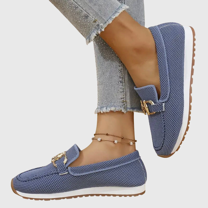 Women's black casual loafers with orthopedic cushioning, ideal for comfortable walking & daily wear.