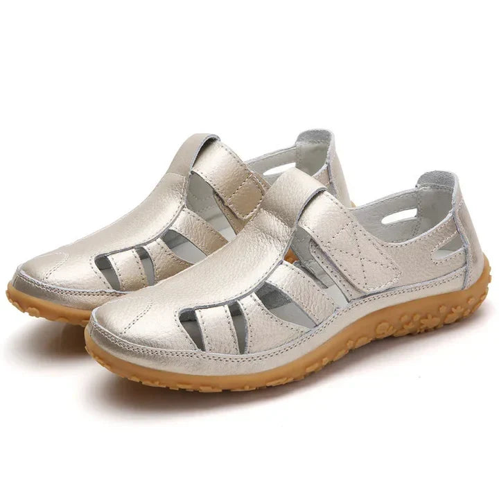 Women's orthopedic sandals for foot health, featuring adjustable straps, arch support & superior comfort.