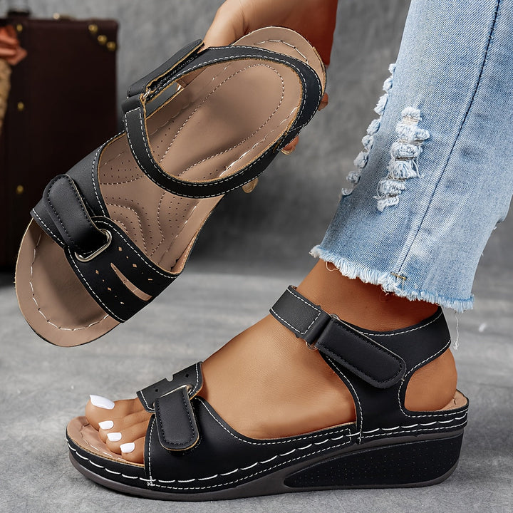 Fashionable women's comfort sandals featuring orthopedic support, adjustable straps & soft cushioned insoles.