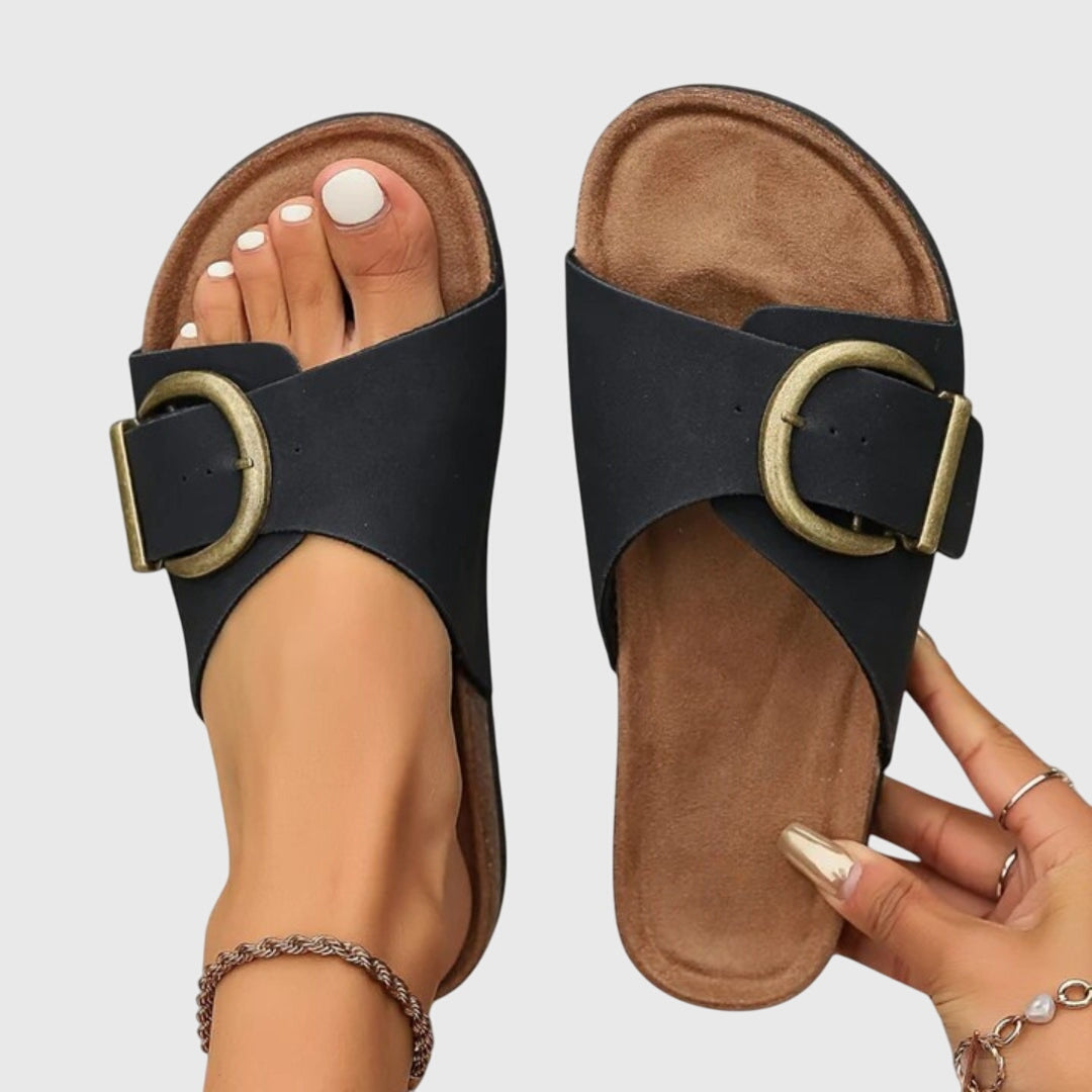 Women's orthopedic comfort sandals with arch support, adjustable buckle, and non-slip sole for all-day wear.