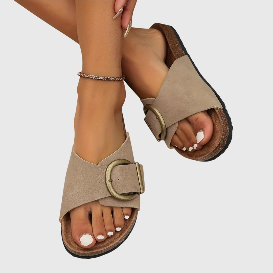 Orthopedic women's sandals with non-slip sole, adjustable buckle, and ultimate arch support for comfort.