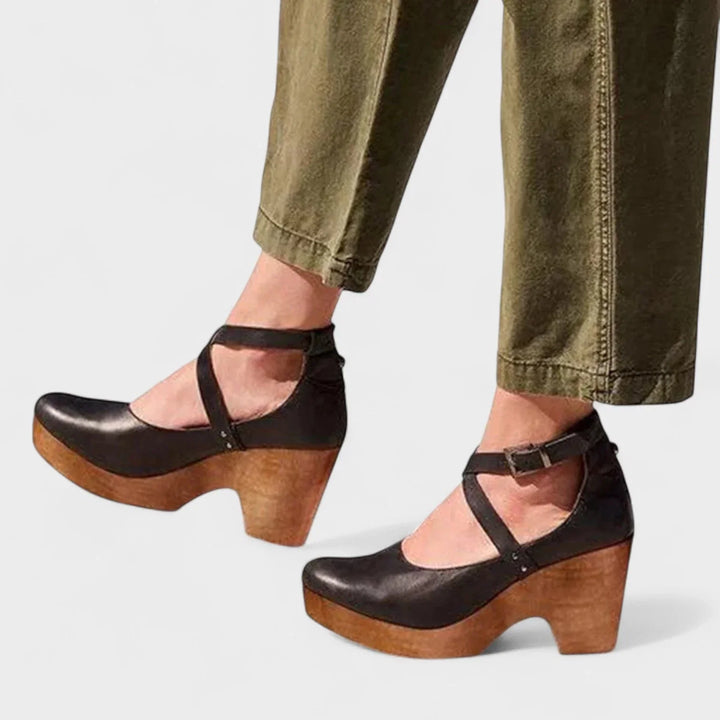 Women's orthopedic comfort sandals with closed toe, platform heel & ankle strap for stylish support.