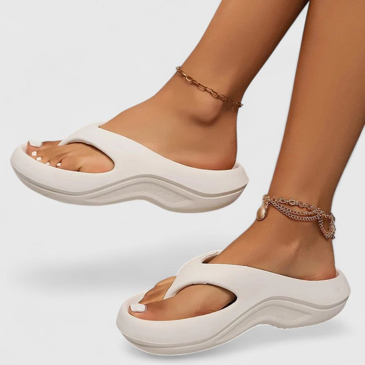 Casual women's slide sandals, perfect summer footwear with ergonomic arch support.