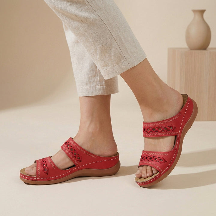 Supportive women's sandals featuring arch support and a comfortable double strap design.