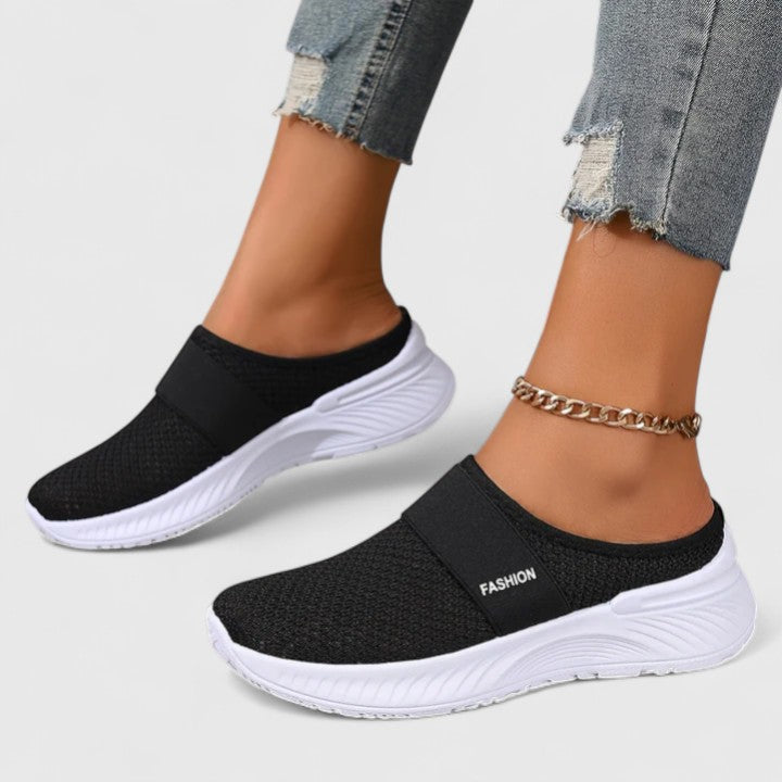Women's comfortable walking shoes with orthopedic features for enhanced support.