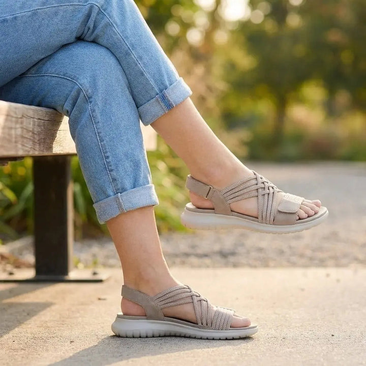 Comfortable women's criss-cross orthopedic sandals. Adjustable, supportive, and elegant for summer walking.