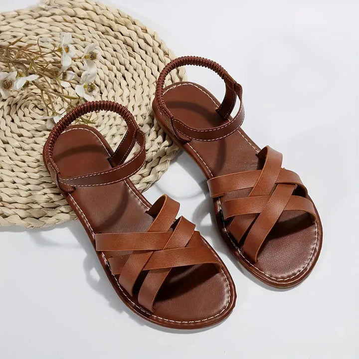 Women's orthopedic criss-cross sandals. Adjustable ankle strap for comfort, support, and spring/summer style.