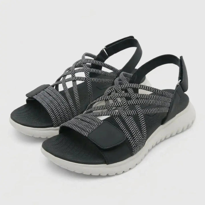 Walking-friendly women's orthopedic sandals. Criss-cross design, adjustable comfort & superior arch support.
