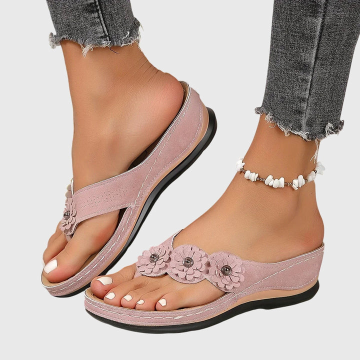 Women's flip flops with advanced orthopedic arch support, perfect for extended walking & all-day comfort.